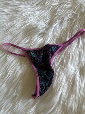 Vintage old Women’s Pink Trim Swim Thong with Peace Sign Print